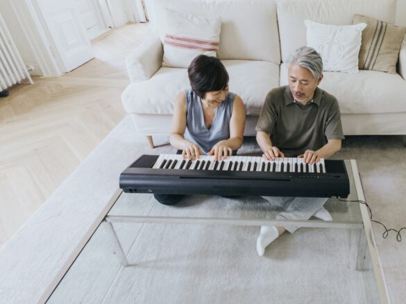 couple playing piano together